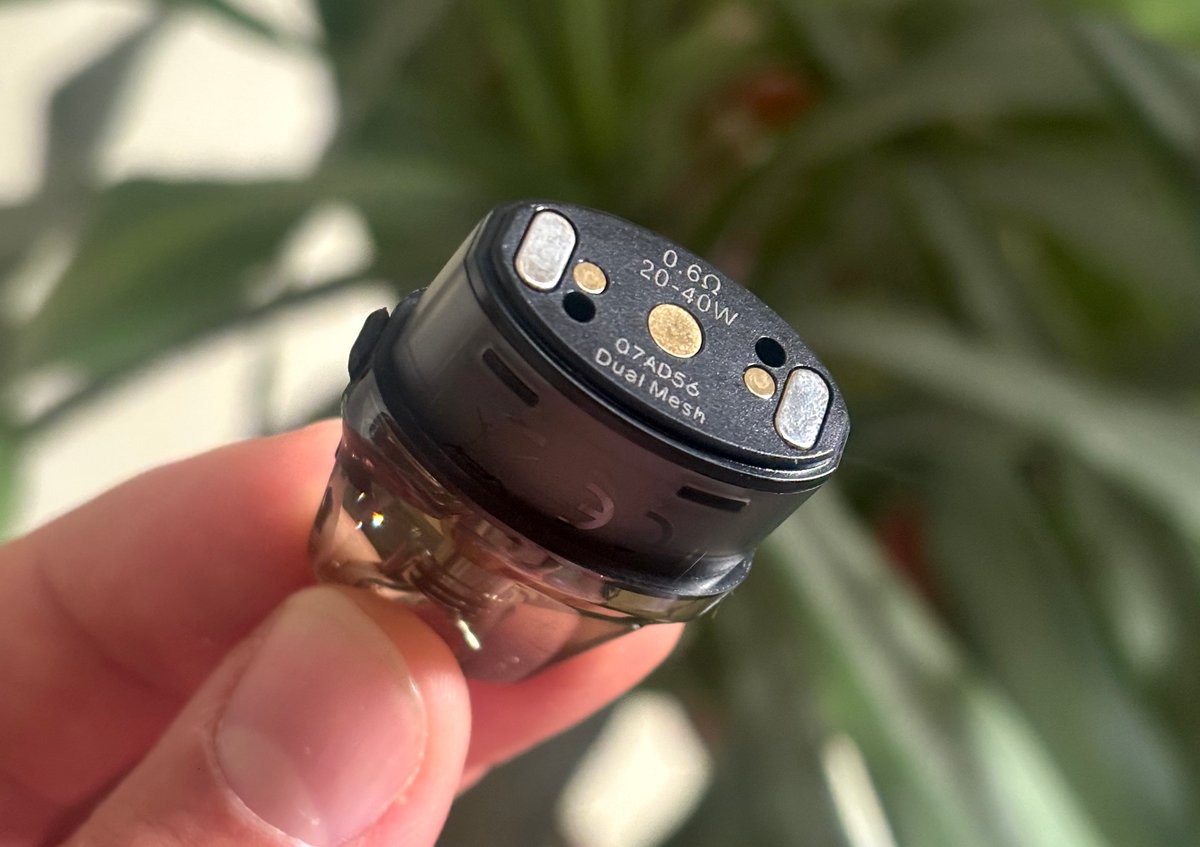 OXVA NeXLIM held up showing the pod wattage number