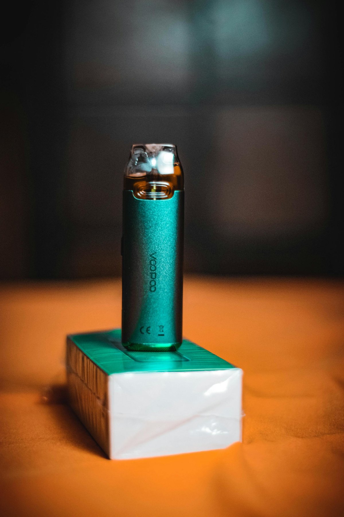 Close-up of a vape device on a clean desk surface